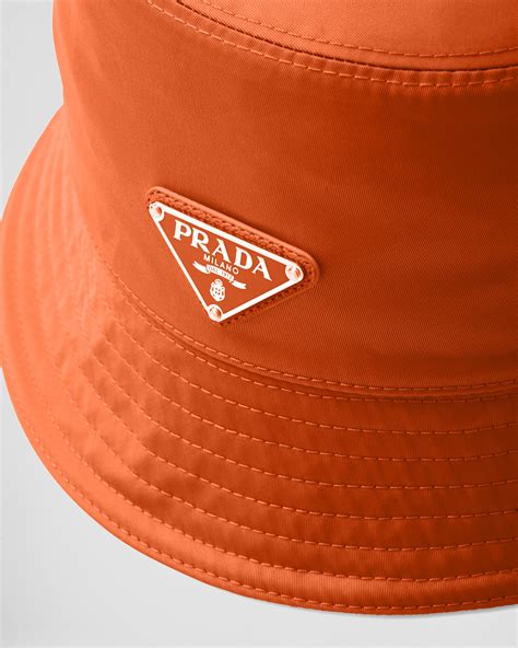 prada cap orange|Prada bucket hats.